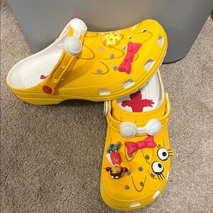CROCS Yellow Clogs with Fun Charms
